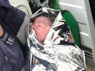 Bebê deixado em caixa de papelão em Dourados foi resgatado e passa bem (Foto: Divulgação)