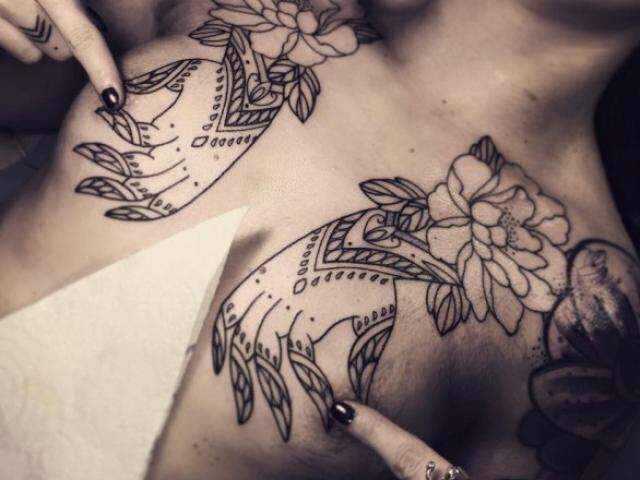 Mulheres de peito aberto para as tatuagens, apesar do medo da dor nos seios