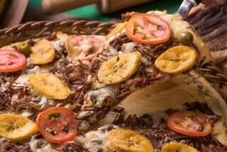 Pizza Pantaneira e mais de 50 sabores para escolher no site da pizzaria. (Foto: Divulgação)