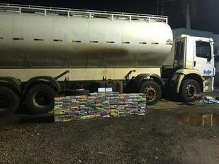 Tabletes de drogas que estavam dentro do tanque do caminhão. (Foto: Divulgação/Polícia Militar) 