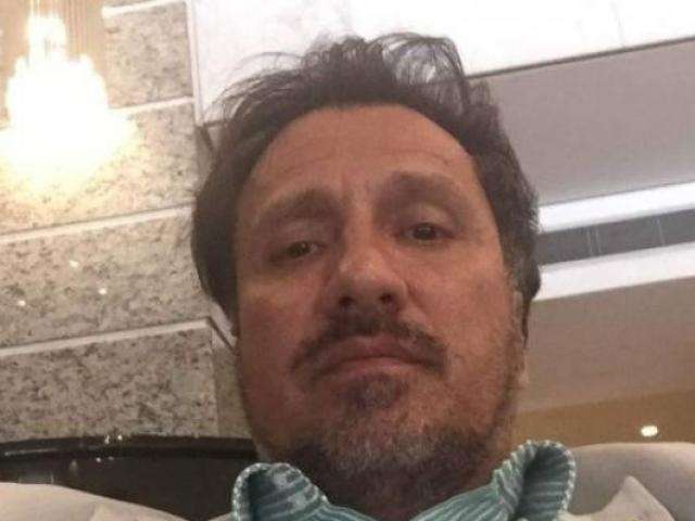 Suspeito de atirar no filho por conta de d&iacute;vida se apresenta &agrave; Pol&iacute;cia Civil