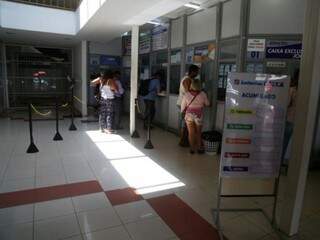 Lotérica vazia no Centro de Campo Grande em dia de pagamento de contas inativas de FGTS (Foto: Alcides Neto)