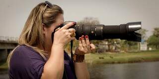 Mulheres de fot&oacute;grafos entraram em cena com eles e hoje dividem paix&atilde;o