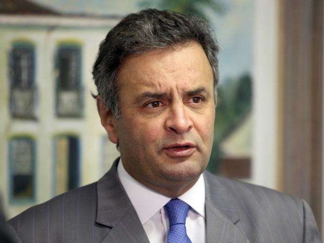 A&eacute;cio diz que vai deixar presid&ecirc;ncia do PSDB para &quot;provar inoc&ecirc;ncia&quot;