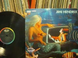 Um dos discos, Jimi Hendrix Johnny B. Goode -Original Video Soundtrack (live 1970)