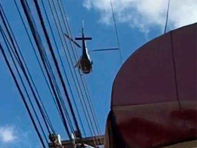 De helic&oacute;ptero, pol&iacute;cia ca&ccedil;a bandidos que atacaram cliente na sa&iacute;da de banco 
