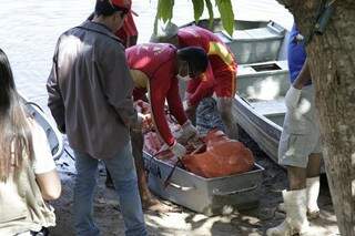 Corpo de servente de pedreiro foi encontrado boiando ontem no rio Taquari. (Foto: PC de Souza/Divulgação)