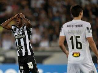 Reação de jogador diante da derrota. (Foto: Mauro Pimentel/AFP) 
