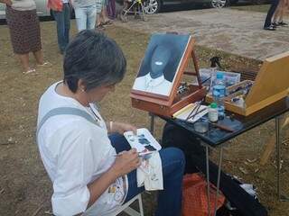 Pintura e outras manifestações artística como forma de protesto no Marco. Na foto, artista pinta quadro.
(Foto: Mirian Machado).