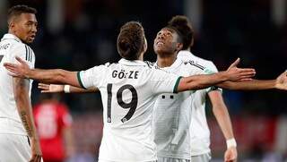 Jogadores do Bayer comemora gol (foto: Globoesporte)