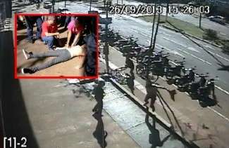 V&iacute;deo mostra jovem tirando a camiseta e partindo para briga antes de ser baleado