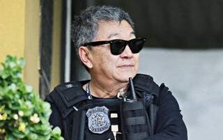 Agente da Polícia Federal Newton Ishii, agente que apareceu com frequência ao lado de presos da Lava Jato agora foi detido. (Foto: GIULIANO GOMES ROMAN)