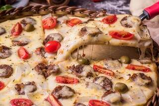 Pizza é elogiada pelos ingredientes frescos e de primeira linha. (Foto: Divulgação)