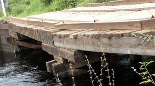 Ponte que foi danificada pela forte cheia de janeiro, no Pantanal da Nhecolândia. (Foto: Divulgação/Agesul)