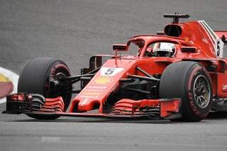 Vettel venceu prova neste domingo e se aproxima do líder. (Foto: John Thys/AFP)
