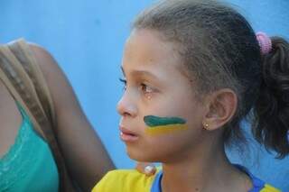 Lágrima escorrendo no rosto de torcedora que acompanhou com afinco uma Copa do Mundo pela 1ª vez (Foto: Paulo Francis) 