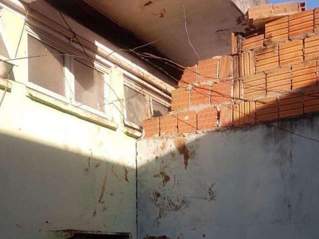 Pol&iacute;cia captura tr&ecirc;s dos dez presos que fugiram de delegacia por t&uacute;nel