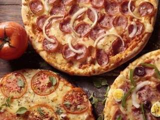 Endereço tem também as pizzas quentinhas e deliciosas da Domino&#039;s. (Foto: Divulgação)