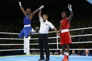 O boxeador segue para a final, com a possibilidade de conquistar o ouro ou a prata, já na próxima terça-feira (16). (Foto: Reuters/Peter Cziborra/Direitos Reservados) 