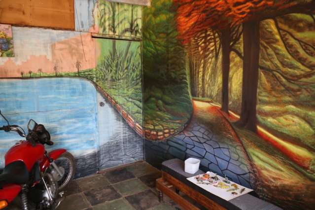 No Nova Lima, muro anuncia aula de pintura por artista que aprendeu com Pantanal