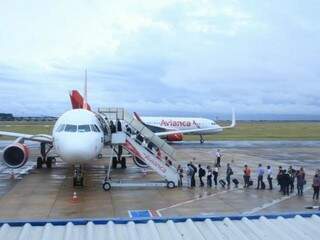 Passageiros embarcam no Aeroporto de Campo Grande (Foto: Marina Pacheco)