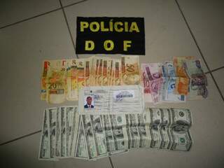 Dinheiro e documento apreendido pelo DOF. (Foto: Divulgação)