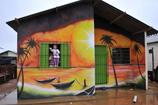 Sair da favela &eacute; sonho que merece belo desenho de praia na fachada da casa nova