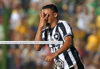 Erik fez 2 dos três gols do Botafogo sobre oDefensa y Justicia, esta noite. (Foto: Javier Gonzalez Toledo/AFP)