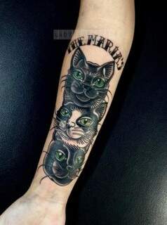 A tatuagem que fez essa semana para suas gatas
