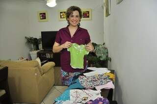 Uma das organizadoras, Ana Paula já separou as roupas da bebê de 9 meses. 