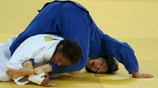 Erika fez luta intensa com japonesa, mas perdeu em tempo extra (Foto: Adrees Latif/Reuters)