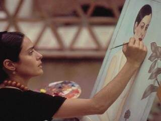 Cena do filme Frida mostra a protagonista pintando. (Foto: Divulgação)