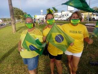 Com m&aacute;scara verde-amarela, manifestantes v&atilde;o para Afonso Pena apoiar Bolsonaro