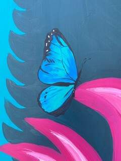 A borboleta azul pousada na planta. (Foto: Arquivo pessoal)