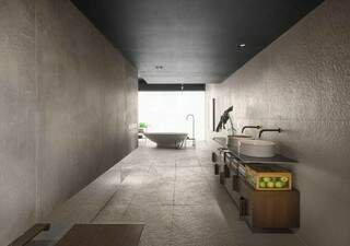 Sala de banho, projeto de Priscila Gabriel, o minimalismo é bem representado no ambiente de 78 m² e o cimento é um dos poucos materiais utilizados. (Foto: Jomar Bragança/Casa Cor)