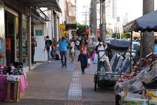 Imagem de rua central da Cidade; Nota Premiada em Campo Grande é com cupons de serviços.