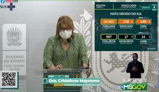 Secretária-adjunta Christinne Maymone em novo cenário na live de apresentação dos dados da covid. (Foto: Reprodução/Facebook)