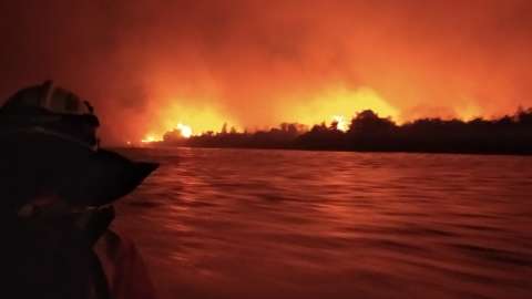 Bombeiros resgatam família em meio a incêndio no Pantanal