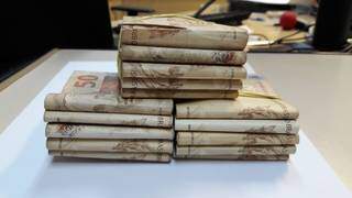 Dinheiro apreendido na casa de investigado em Campo Grande (Foto: PF/Divulgação) 