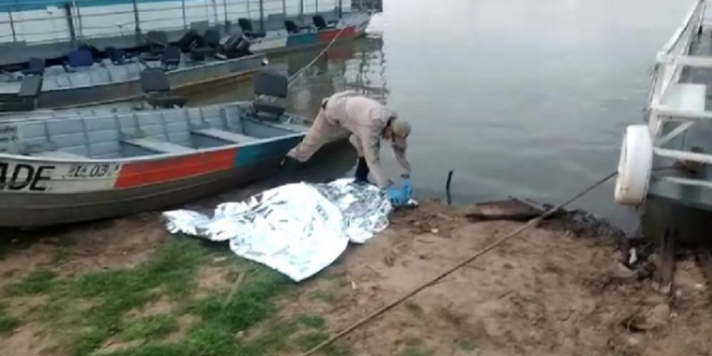 Corpo &eacute; encontrado em rio com espingarda amarrada por cord&atilde;o