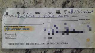Foto do cheque encontrado (Foto:Direto das Ruas)