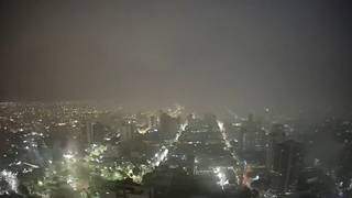 Imagem aérea de Campo Grande no momento da chuva (Foto: Clima Ao Vivo/Reprodução)