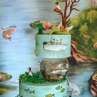 Pantanal inspira aniversário com bolo de peixe, tuiuiú e caranguejo