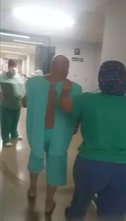 Imagem do vídeo mostra que enfermeiros tentaram segurar &#34;fugitivo&#34; quando ele já estava no andar da esposa.