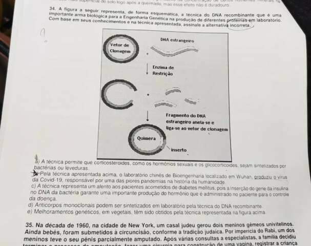 Prova para selecionar professores polemiza ao dizer que covid vem de laborat&oacute;rio