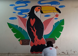 Pintura de mural para o projeto Visões do Pantanal. (Foto: Divulgação/Very Ruim)