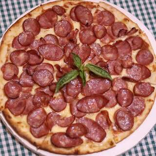 Pizza de calabresa com mel &eacute; novidade na Arthur Jorge