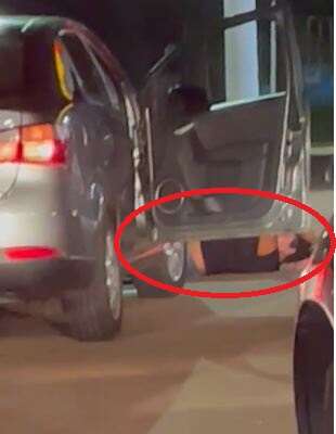 Mulher deita na frente de ve&iacute;culos para evitar que &quot;caras de pau&quot; furem fila  
