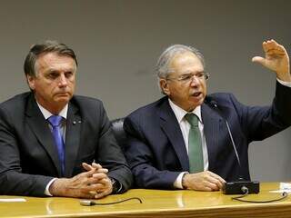Presidente Jair Bolsonaro ao lado do ministro da Economia, Paulo Guedes (Foto: Wilson Dias/Agência Brasil)