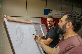 Fabio Quill e Wanick Correa durante criação de quadrinhos ao vivo. (Foto: Paulo Francis)